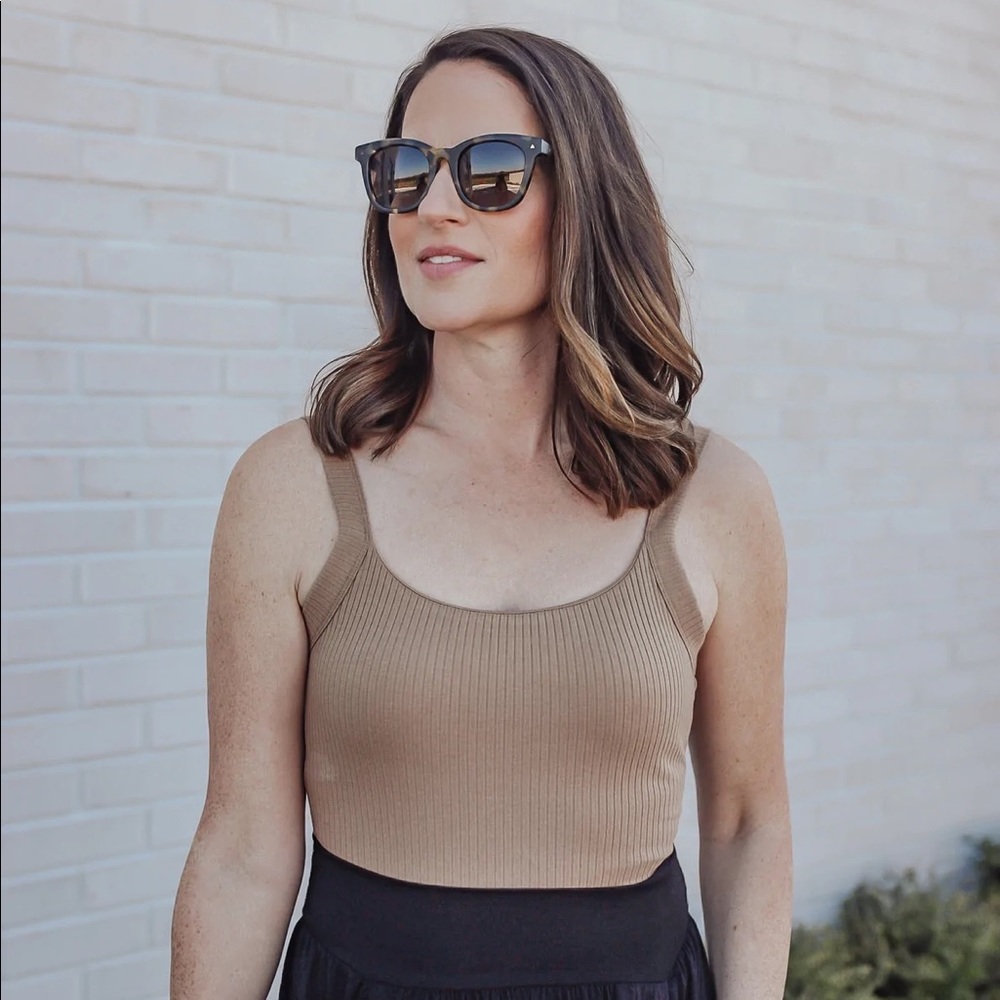 good american ribbed scoop neck bodysuit in taupe. thong cut caramel brown